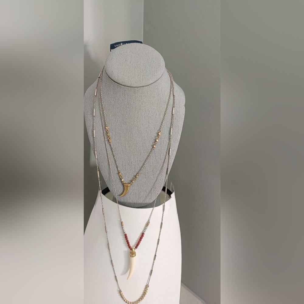 Lucky Brand Silver and Gold Three Tier Chain Necklace.